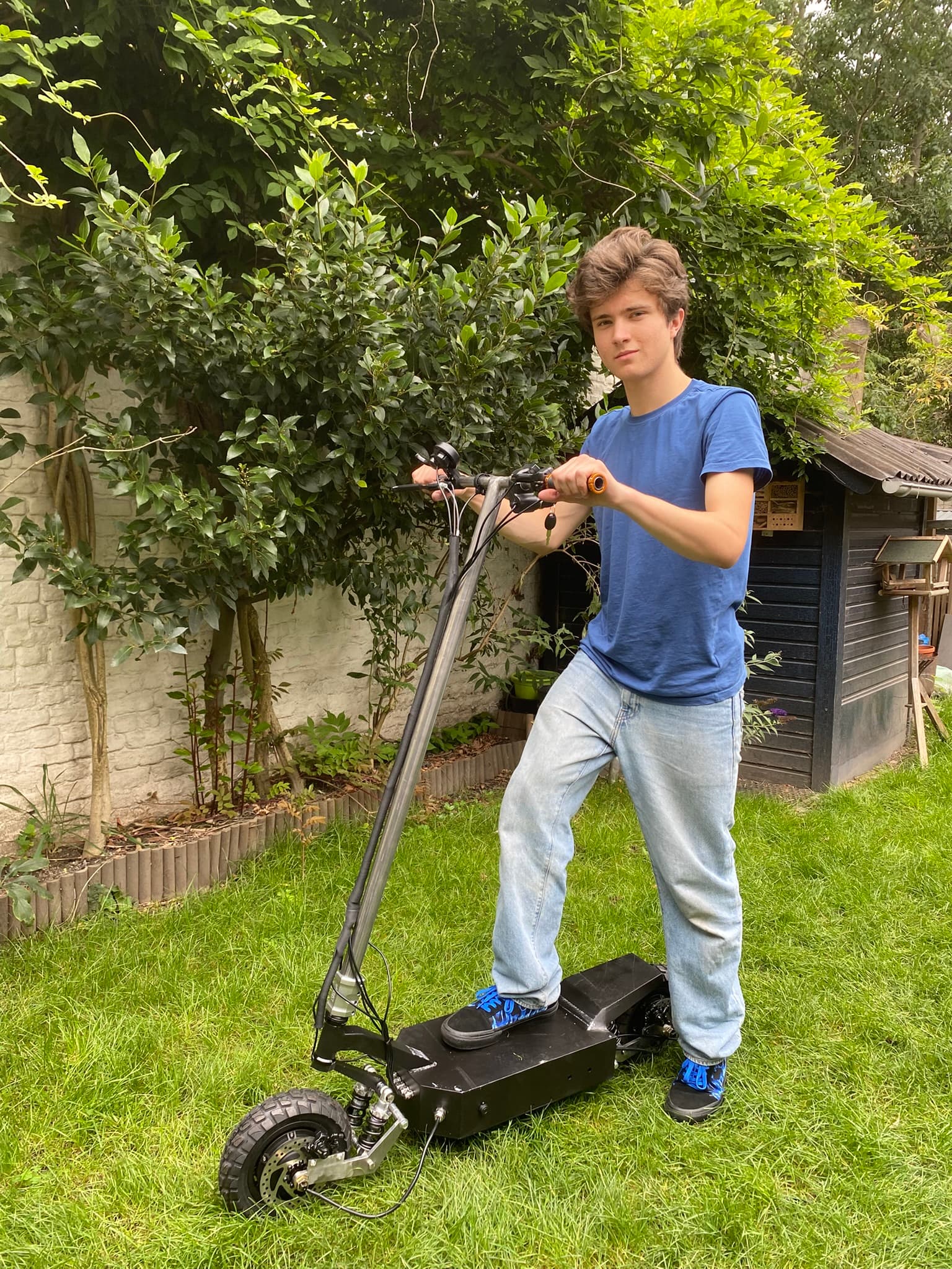 Electric scooter in the backyard